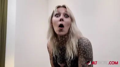 Nayomi Sharp Tattooing herself AltErotic Logo