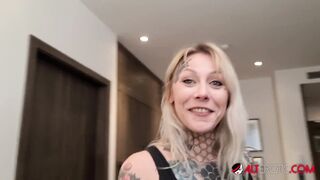 Tattooed babe Nayomi Sharp sucks Sascha's big cock