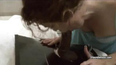 Sucking Black Cock in a Box