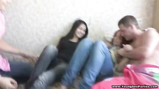 Foursome with redhead and Asian teens