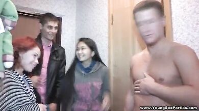 Foursome with redhead and Asian teens