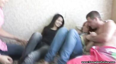 Foursome with redhead and Asian teens