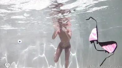 Underwater erotic fingering