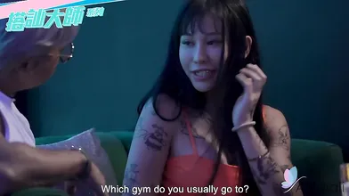 Yaner is a busty brunette with tattoos dressed in red. Our guy sat down