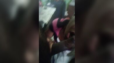 Sucking on a 10inches chocolate dick