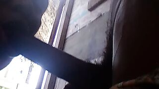 Sucking on a 11inches chocolate dick