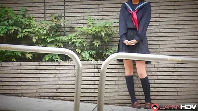 Fu Sazanami is doing one of her pick up days out in the street. She has