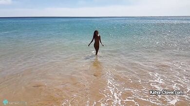 Naked babe on the beach