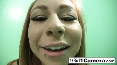 Scarlett Pain plays with her camera