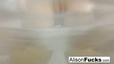 Buxom Alison Tyler takes a bath and rubs herself down