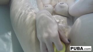 Nadia takes a bath with some rubber duckies