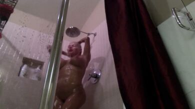Nikita takes a hot shower