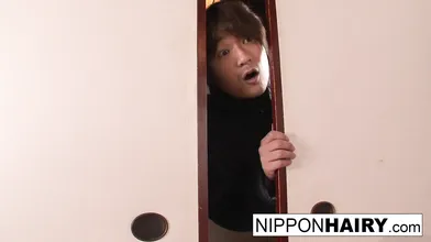 Japanese girl plays with her pussy while some boys peep