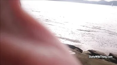 Playing with pussy at beach