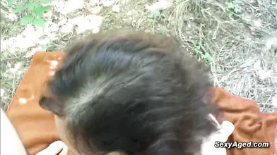 Hairy granny Franca fucking in the woods in the middle of the day