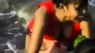 2 Indian girls with white guy in beach have fun blowjob..