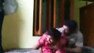 Indian couple enjoying in a hotel room