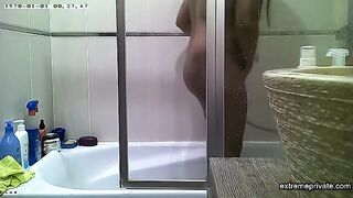 Curvy indian stepmom spied in the shower