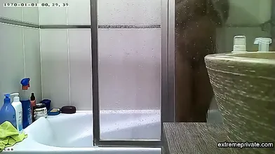 Curvy indian stepmom spied in the shower