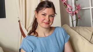 British mom strips off her clothes and works her hairy pussy