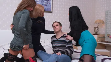 Three sexy Milfs share one toyboy during hot group sex