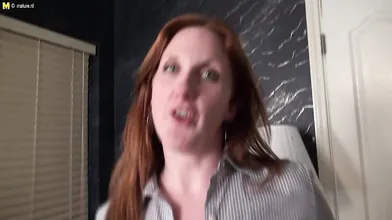 Sexy American redhead enjoys her toy in the bathtub