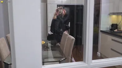 Hot babe getting fucked with a strapon by a lesbian MILF