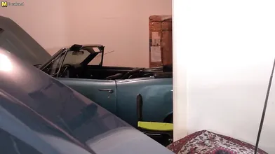 Naughty mature female mechanic getting greasy in her garage