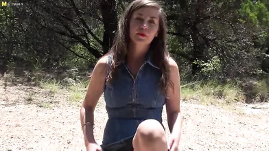 This hairy mom loves playing with herself in a forest
