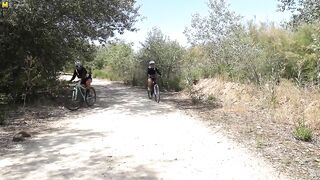 Two hot big breasted MILFs ssuck and fuck a younger biker in the open air