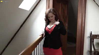 Big breasted MILF playing with herself in the hallway