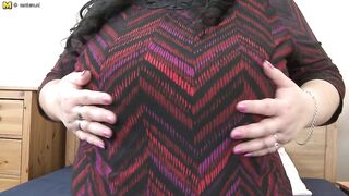 Huge breasted mature lady playing with herself