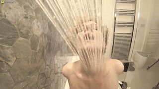 Steamy MILF with big tits playing in the bathroom