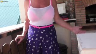 Naughty big breasted MILF playing in the sun with her pussy