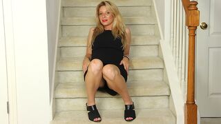 Naughty American MILF playing with her pussy on the stairs