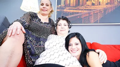 Three old and young lesbians making out on bed