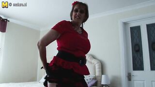 Horny British mature woman playing with her unshaved pussy and her round natural tits
