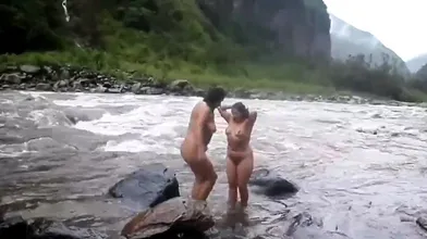 Two indian mature womens bathing in river naked