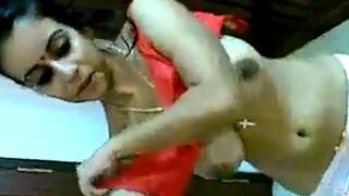 gorgeous Indian girl getting dressed