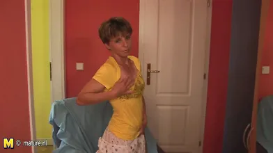 Naughty housewife playing with her wet pussy