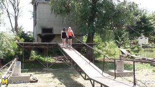 Hot babe doing a naughty older lesbian on holiday