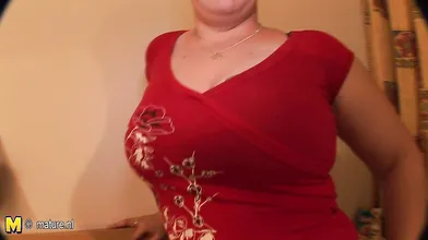 Big breasted mature slut sucking cock
