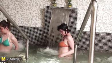 Lovely mature women relaxing in a sauna