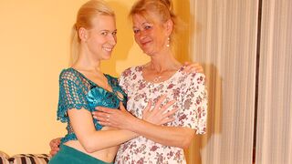 Two blonde old and young lesbians have fun