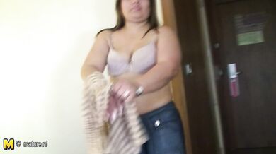 Chubby housewife playing on her bed