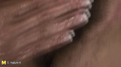 This mama gets fisted by a hot babe