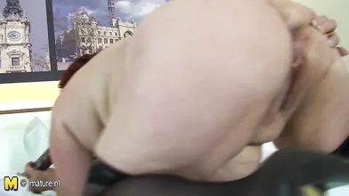 This big mama sure loves her hard dildo