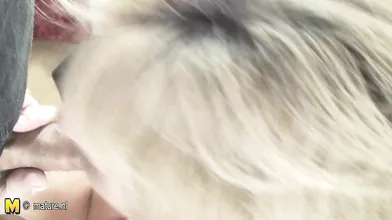Kinky mama munching on a bunch of black cocks