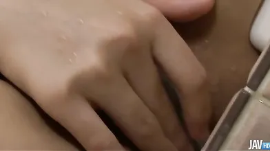 Noriko Kago gets horny in the shower and begins to finger her sweet little pussy
