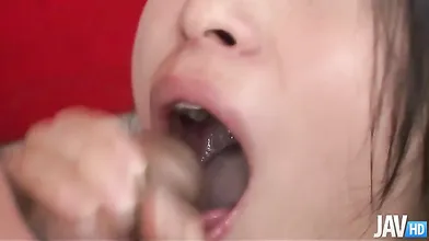Two horny guys surround gorgeous Nana Kunimi feeding her dicks for dinner.